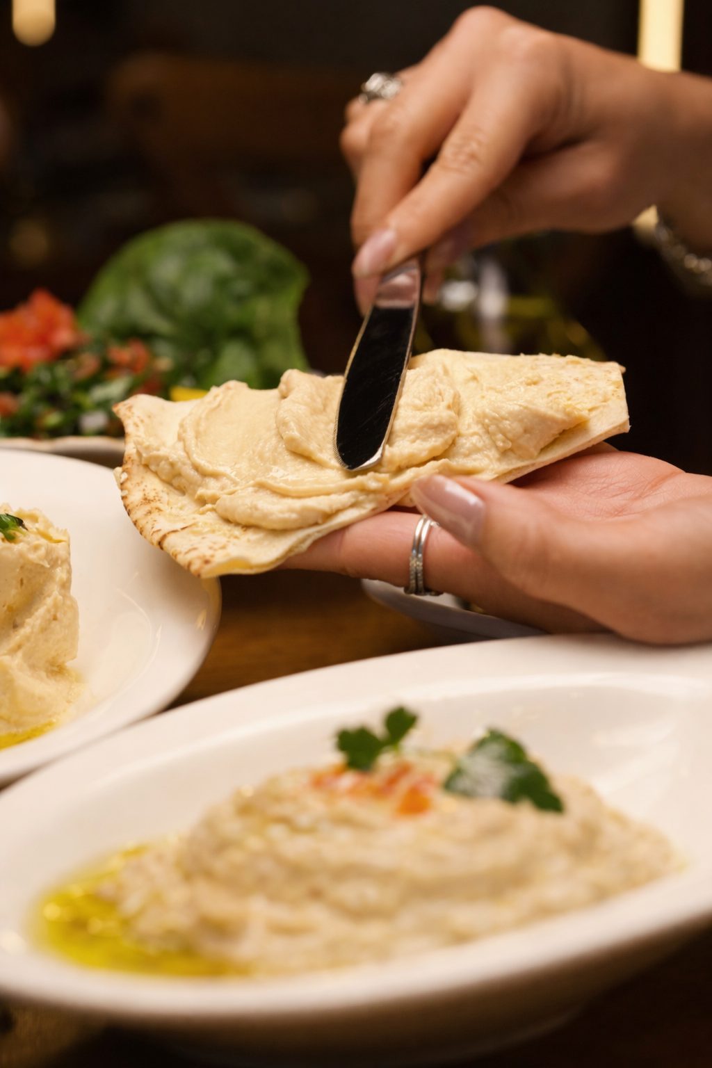 Classic Hummus with olive oil and pita at Layali Miami