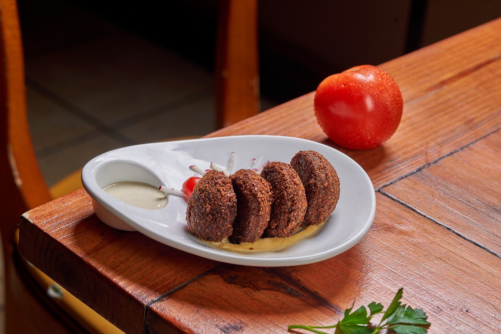 Crisp Falafel with tahini sauce at Layali Miami
