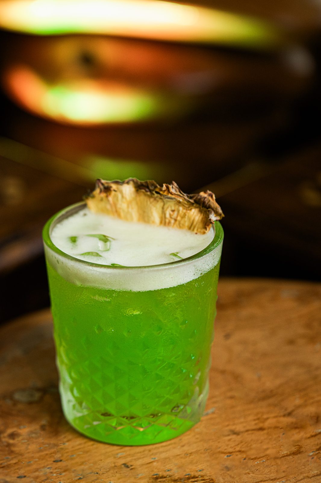 Green signature cocktail at Layali Miami