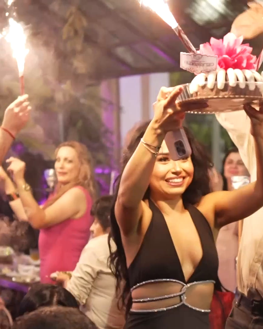 Birthday cake with sparklers carried through Layali Miami