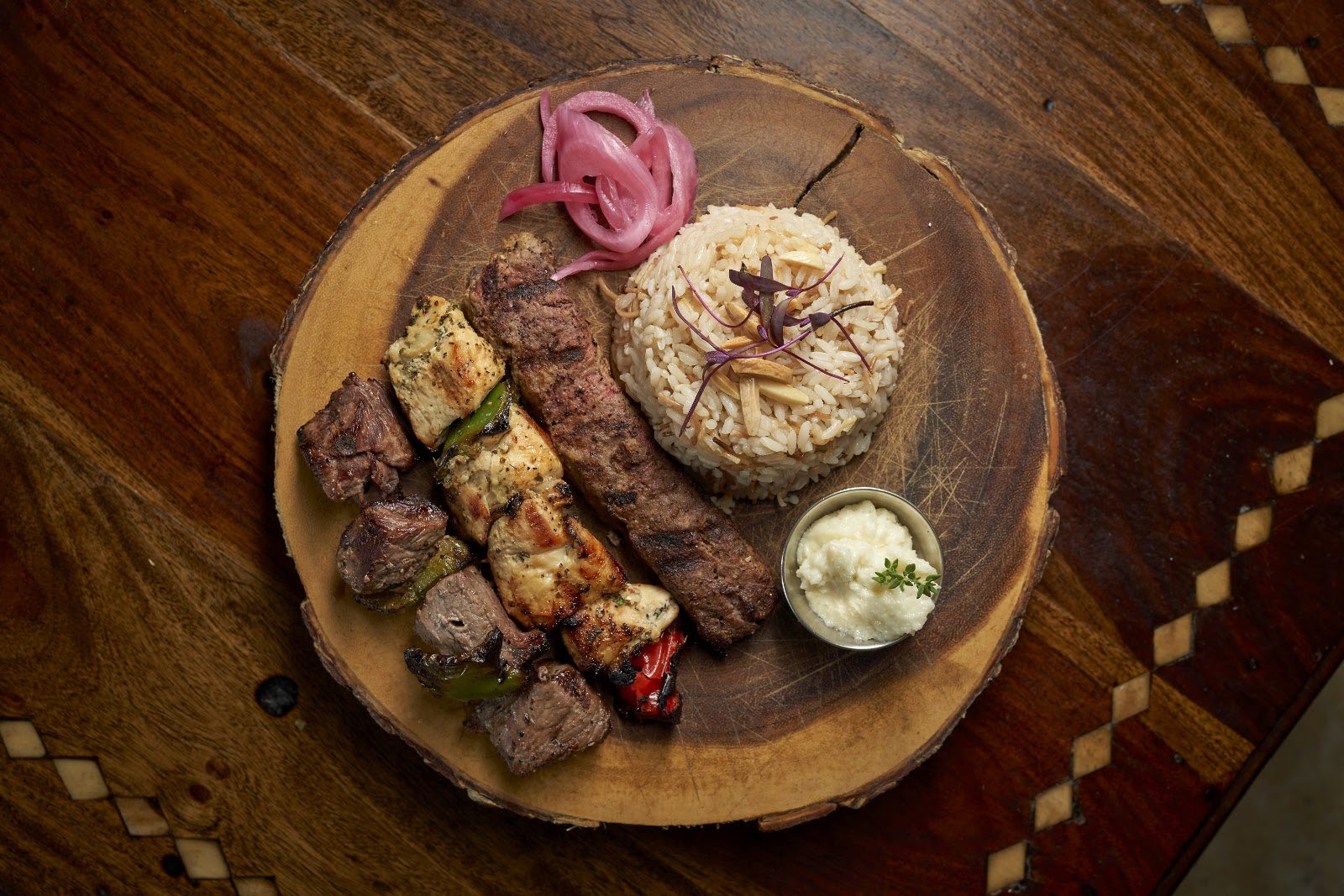 Layali Miami mixed grill with rice and vegetables